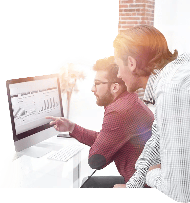 people looking at a computer image